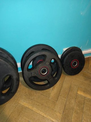 BARRA DE MUSCULACION CON PESAS