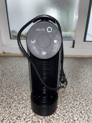 Cafetera Delta Q + cápsulas