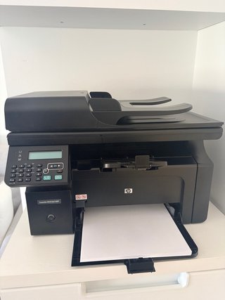 Impresora HP LaserJet M1212nf MFP
