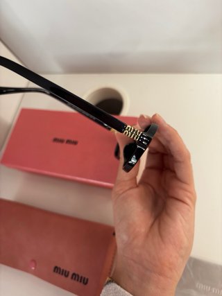 Gafas de sol Miu Miu negras