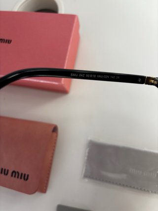 Gafas de sol Miu Miu negras
