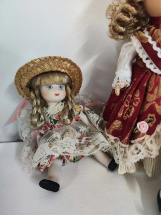 Colección de 4 Muñecas de Porcelana