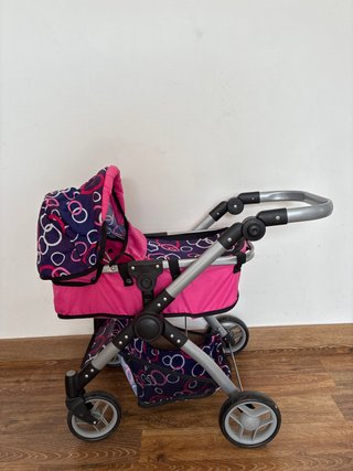 Cochecito de juguete rosa y azul
