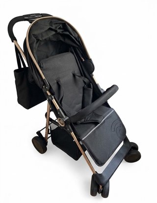Silla de paseo negra y dorada