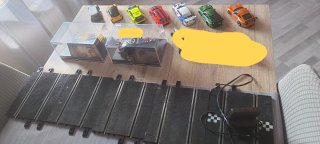 Lote 9 coches Ninco + 3 circuitos + accesorios