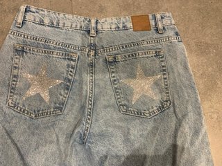 Pantalones Brownie con estrellas talla 36