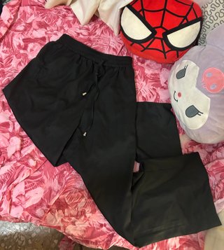 Pantalones negros anchos
