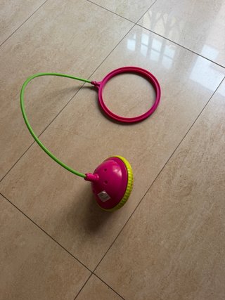 Saltador de tobillo con aro rosa y verde