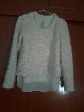 Blusa de punto blanco