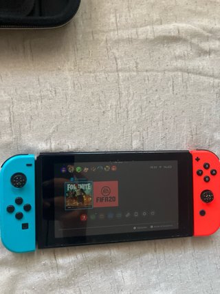 Nintendo Switch + FIFA 21 + Accesorios