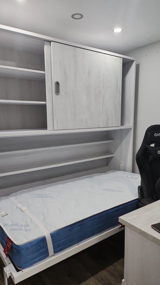 Mueble modular con armario, cama abatible y mesa