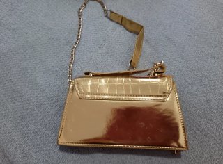 Bolso de fiesta dorado