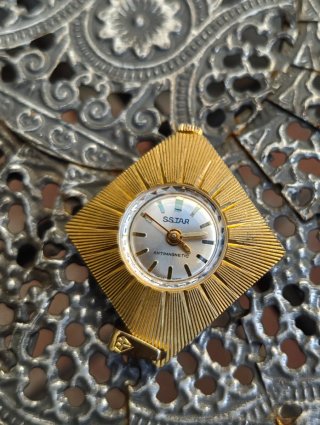 Reloj SSTAR de cuerda Oro