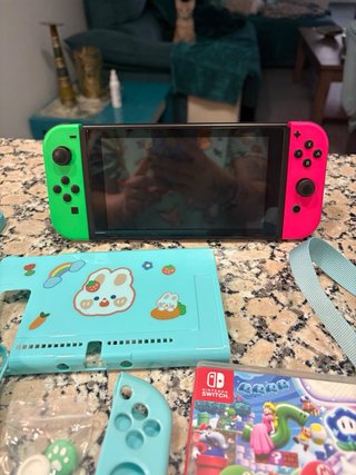 Nintendo Switch con accesorios y juego