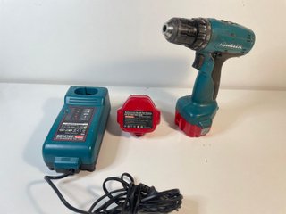 Taladro Makita 6270D con cargador y batería