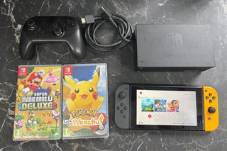 Nintendo Switch + Mando Pro + 2 Juegos