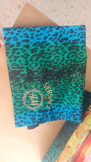 Sandalias Versace x H&M Edición Limitada
