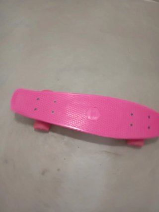 Monopatín rosa