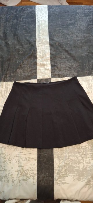 Falda mini plisada negra
