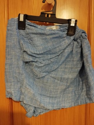 Falda corta beige con volante Pantalones cortos