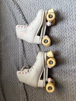 Patines Oxelo blancos y rosas (con cubrepatines)