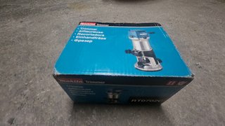 Fresadora Makita RT0702C 710W + Accesorios
