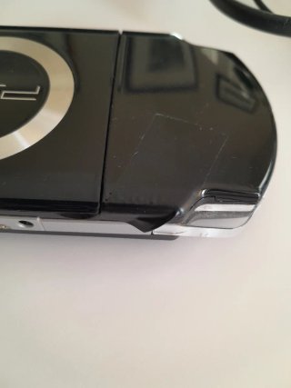Console Sony PSP 2004 nera con caricatore e custodia