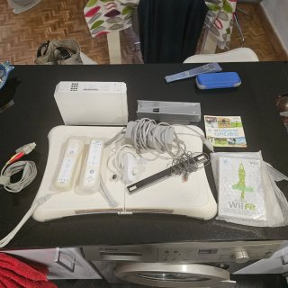 Nintendo Wii + Accesorios y Juegos