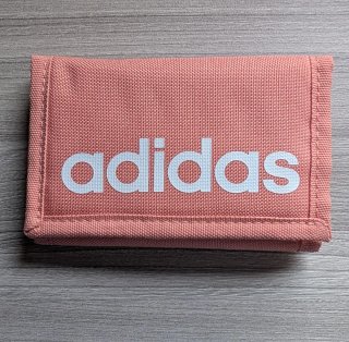 Cartera juvenil Adidas en color salmón