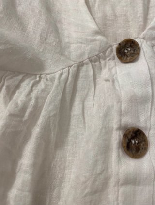 Blusa peplum y manga acampanada