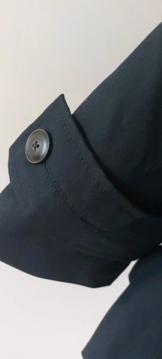 Abrigo Zara con capucha y cuello de pelo.