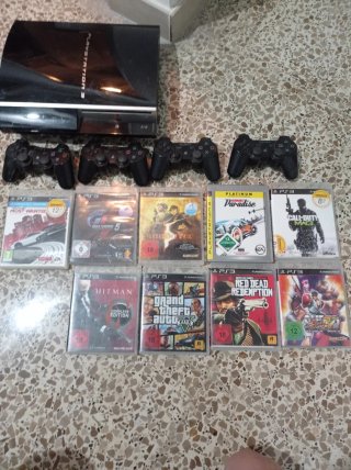 Consola PlayStation 3 (PS3) con 4 mandos y 9 juego
