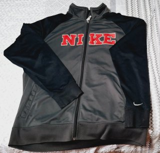 Chaqueta deportiva Nike hombre gris y negra