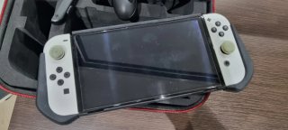 Nintendo Switch OLED + giochi e accessori