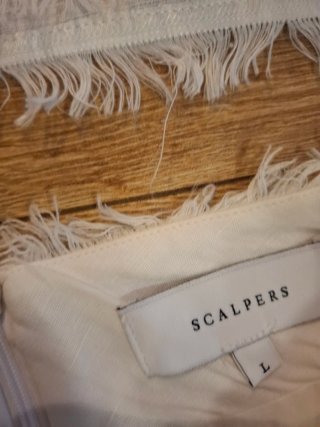 Conjunto Scalpers Top y Falda Blanco