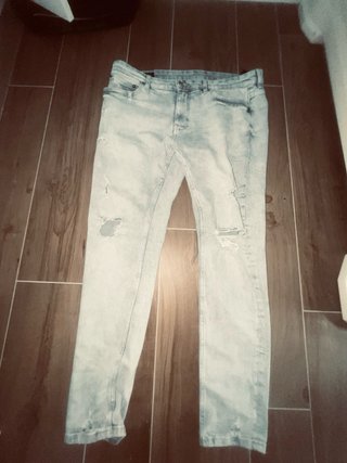 Pantalones vaqueros grises skinny rotos