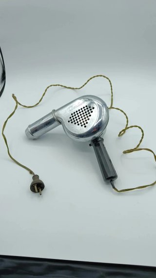 Secador de pelo antiguo Calor