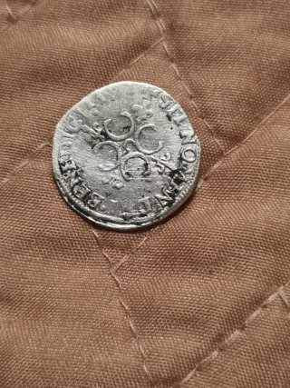 Moneda antigua de plata