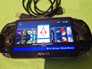 PlayStation Vita Sony PS Vita PSP Vita Sony - Console portatile in nero con cavo di ricarica