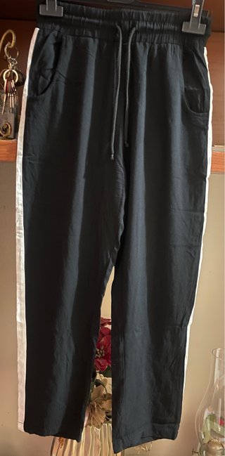 Pantaloni sportivi neri con banda laterale