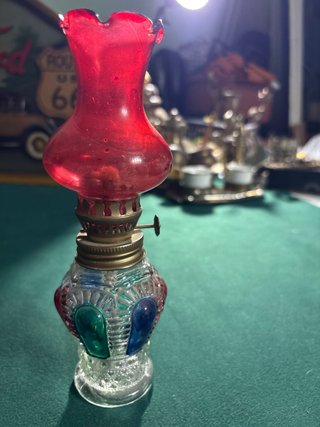 Antica lampada a petrolio in vetro