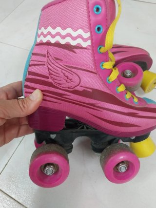 Patines de cuatro ruedas rosas