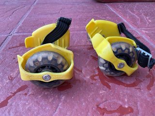 Rollers/ Patines de talón ajustables amarillos