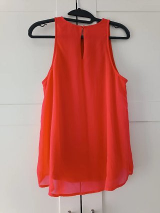 Blusa color coral sin mangas