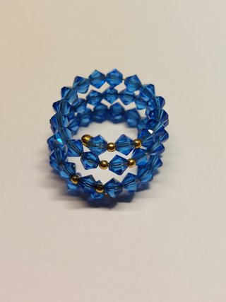 Anello a spirale blu e oro 750
