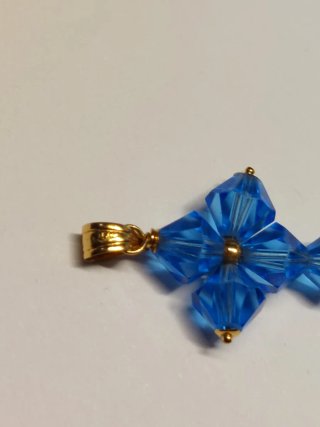 croce con cristalli blu e oro 750