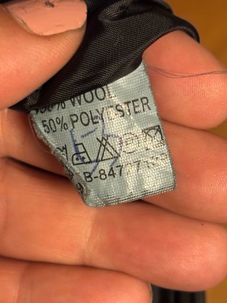 Abrigo negro con cinturón