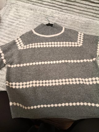 Jersey de punto gris y blanco