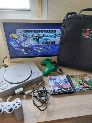 PS1, 2 mandos, maletín y juegos