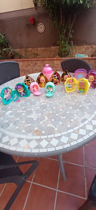 Set de 9 Bebés Llorones con sus cápsulas y carrito
